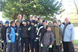 image of volunteers digging and planting