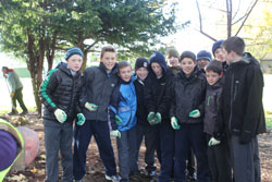 image of volunteers digging and planting